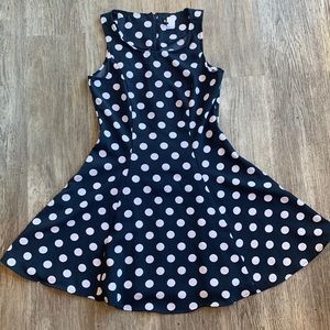 Navy and white polka dot fit and flare dress
